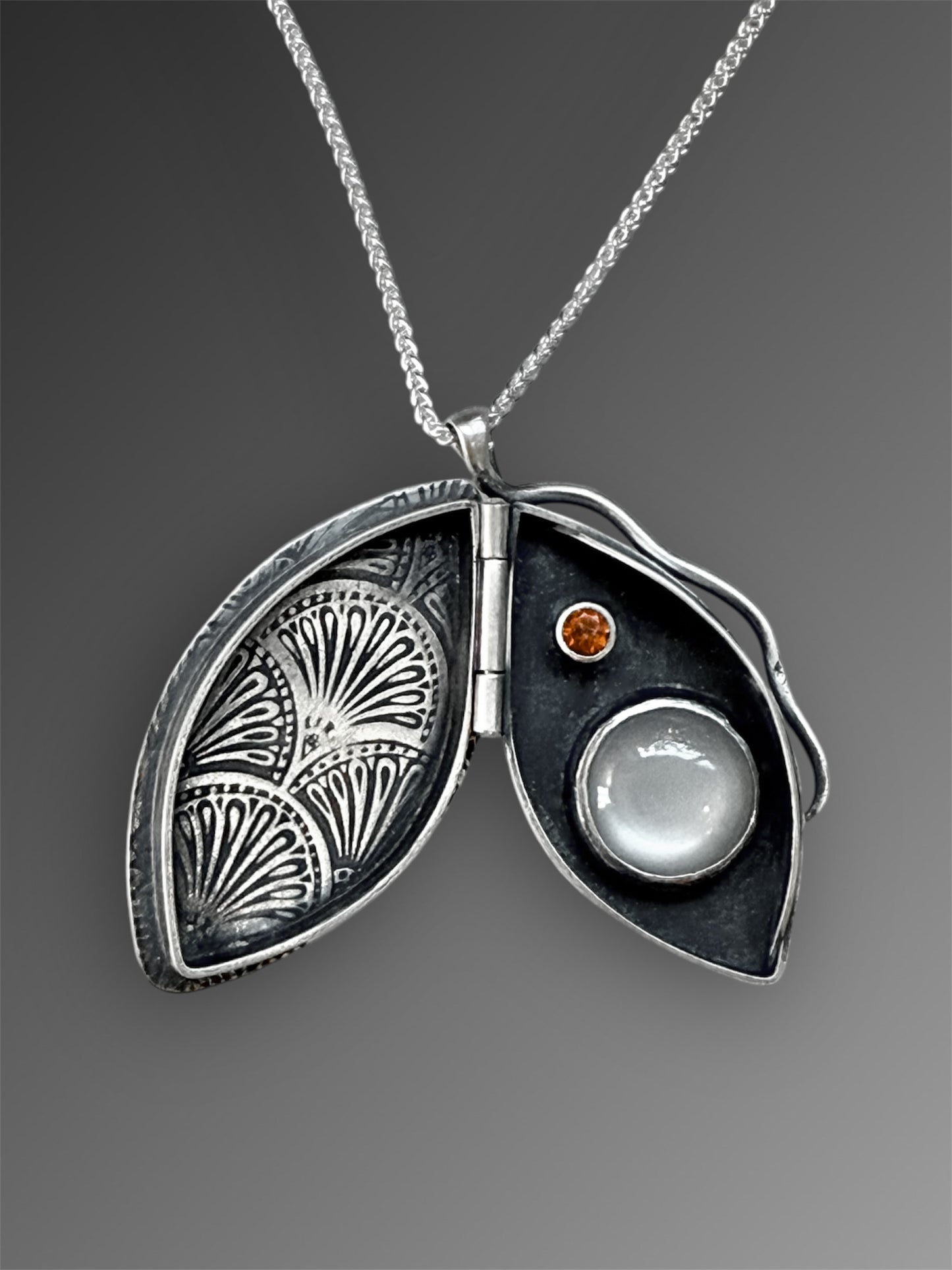 Reserved for Cindy I.: Story Locket with Agua Nueva Agate, Gray Moonstone, and Spessartine Garnet